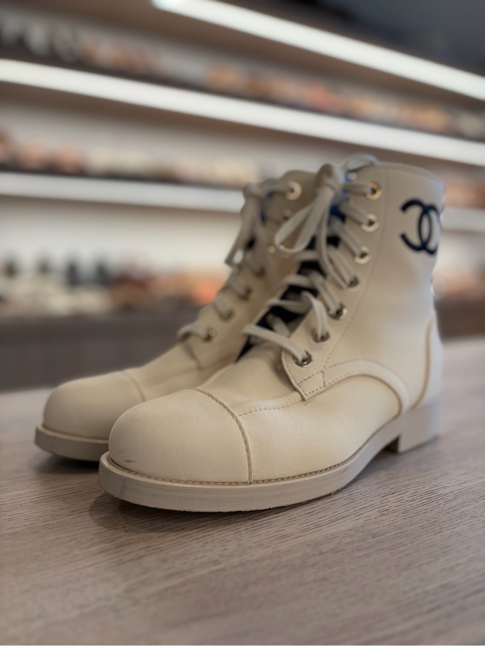 CHANEL Cream Leather Lace-Up Combat Boots with Navy CC - Picture 2 of 8